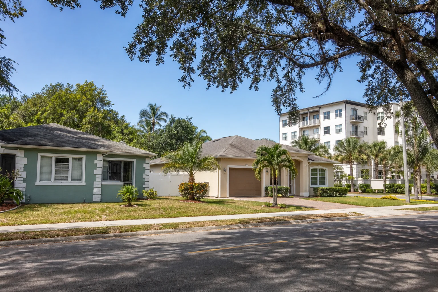 Everyday Florida homes with practical pitched roofs and mature landscaping